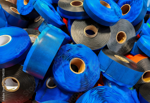 rubber bands wrapped with perforated blue polyethylene... rubber  rolls