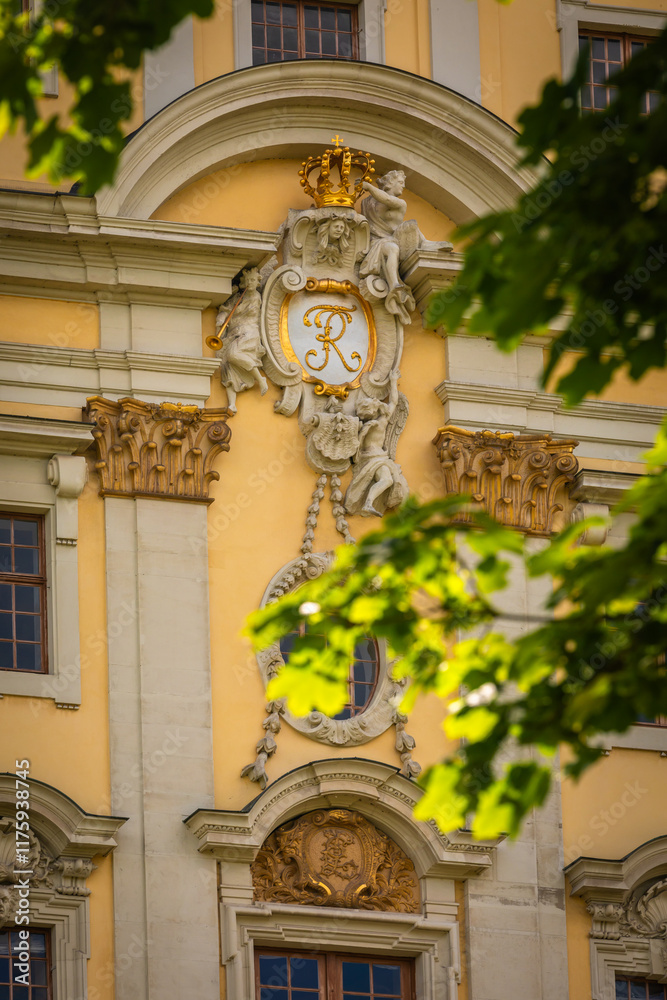 Fototapeta premium Partial View of the Main Building of Schloss Ludwigsburg (Ludwigsburg Palace) with Royal Emblem on a sunny Summer Day; Close-up