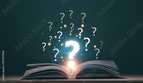 Education for new knowledge concept. Open book on wooden floor with question marks above. Questioning. Illustrating curiosity. Learning. Knowledge seeking. Read for problem solving.