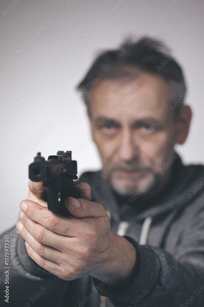 Man take care of small caliber semi automatic sporting gun .22 LR Man take care of small caliber semi automatic sporting gun .22 LR