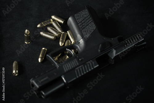 Unloaded semi automatic pistol handgun at home with munition