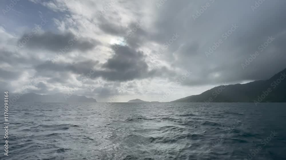 dark clouds over the sea, Calm and peaceful view of dark black sea water surface, cloudy sunset or sunrise sky, Storm clouds, dark sky, gloomy rain clouds over calm sea background dark clouds over the sea, Calm and peaceful view of dark black sea water surface, cloudy sunset or sunrise sky, Storm clouds, dark sky, gloomy rain clouds over calm sea background