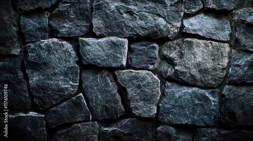 Fototapeta na wymiar Dark slate stone wall with rich texture, ideal for use in modern architectural backgrounds, exuding both strength and sophistication.