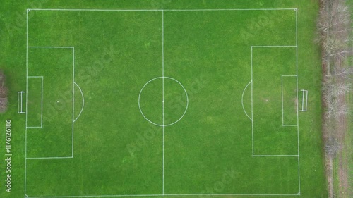 A 4K bird's eye view of a soccer field, showcasing the full layout of the pitch and the action. Ideal for sports, cinematic, and aerial content.

