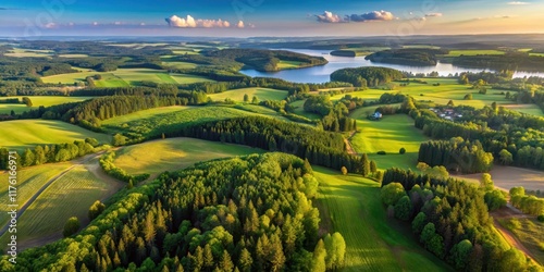 Fototapeta Naklejka Na Ścianę i Meble -  Aerial view of Mazury's landscape with rolling hills and forests , natural scenery, Mazury