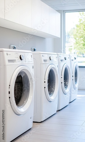 Wallpaper Mural Modern laundry room with four white washing machines in bright interior space featuring natural light Torontodigital.ca