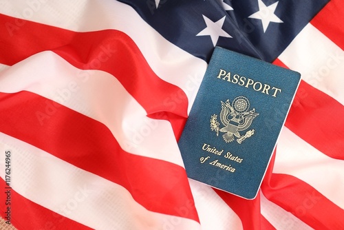 Latest version of United States of America citizen Passport on USA national flag