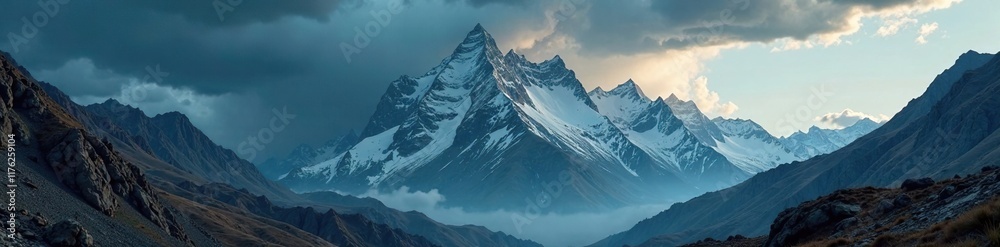 Obraz premium Majestic mountain range amidst a swirling storm, mountains, rugged