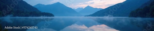 Nighttime mist settles over mountain lake's surface, stillness, lake, reflective