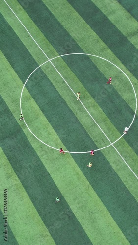People Playing Football on the Field