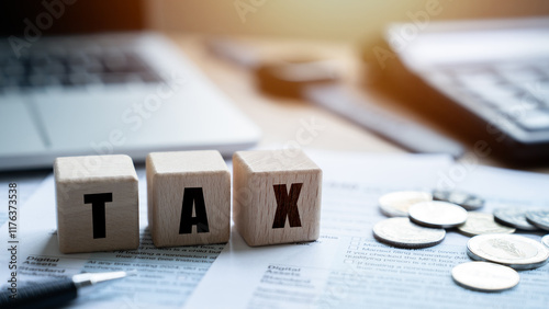 tax 2025 symbol. word TAX 2025 on a calculator with documents on the desk. Income tax filing and tax filing to pay tax documents online.