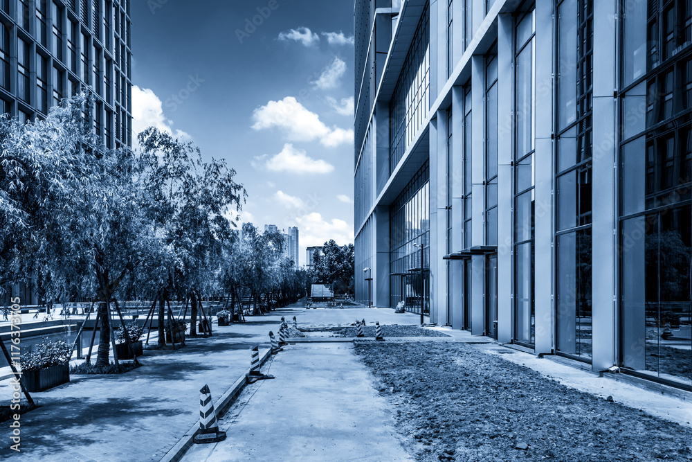 Fototapeta premium Modern Architectural Landscape with Lush Greenery in Urban Setting