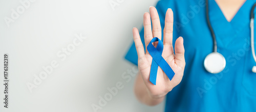 Canvas Print March Colorectal Cancer Awareness month, doctor with dark Blue Ribbon for supporting people living and illness