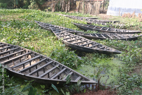 wooden boat on small lake photo