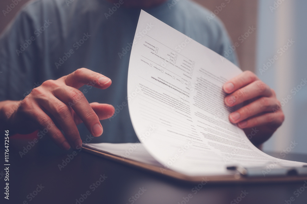 Fototapeta premium Document and data analysis concept, man hand holding or handing over document paperwork on clipboard, documentation, document data management system