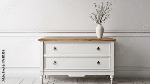 a white dresser with a vase on top of it