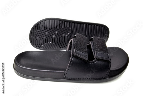 Black Slipper Sandals side and bottom view isolated on white background with clipping path. Design mockup. Open toe slide slippers or beach flip flops with velcro and buckle straps. Casual concept. photo