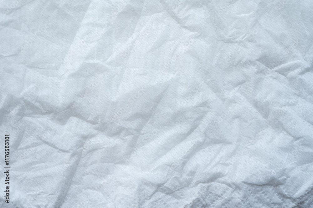Obraz premium Full frame shot of crumpled tissue fabric texture and background. Tissue fabric is slightly rough and crisp in texture.