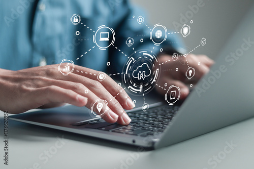 Cloud technology concept. Person using laptop with cloud storage network technology, large network of backup platforms, online data storage for business networks with cyber security software.