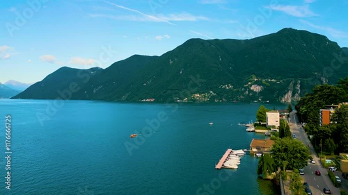 4K Aerial Drone Video of Villas and Marina on the shore of Lake Como in Menaggio, Italy photo