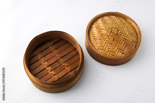 Close-up photo of Wooden dimsum steamer container isolated on white background. Shot on 30 Degree, flat lay angle setup photo