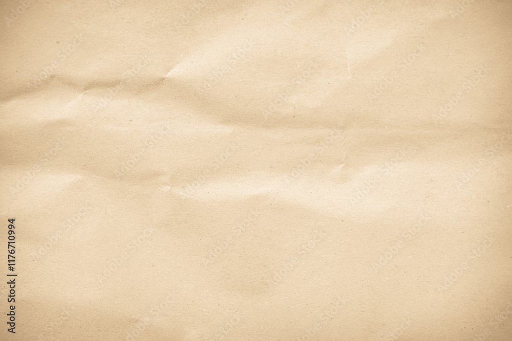 Naklejka premium Crumpled brown paper texture background for design with copy space for text or image.