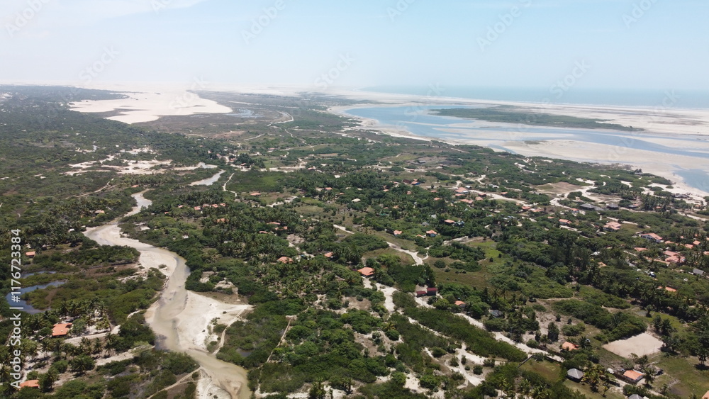 Fototapeta premium Vue aérienne du village Atins avec suivit de voiture, Brésil 