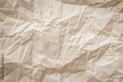 Crumpled brown paper texture background for design with copy space for text or image.