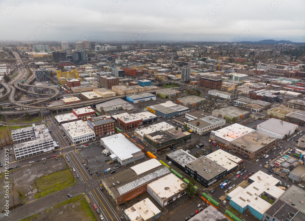 A city view from above with many buildings and cars
