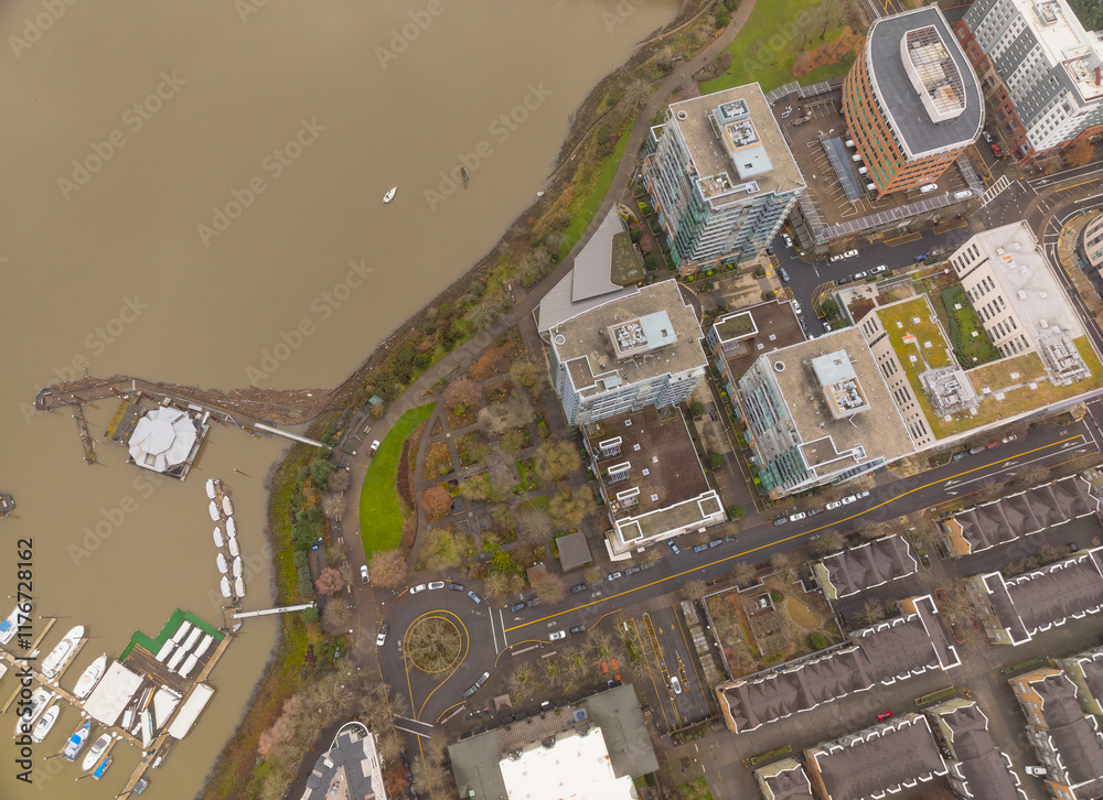 A city view with a river and a marina