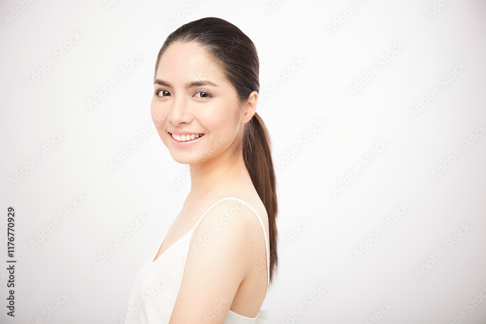 Portrait of Asian girl smile on white background Portrait of Asian girl smile on white background