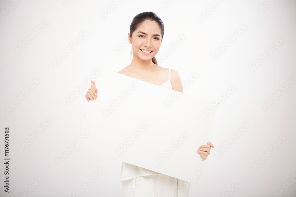 Asian girl show blank label on white background Asian girl show blank label on white background