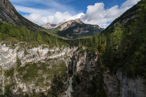 View into the Val Travenanzes valley with the river Rio Travenanzes in the Parco Naturale Regionale delle Dolomiti d'Ampezzo, Italy. photo