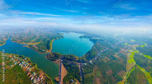 Aerial view of Bien Ho Che or Bien Ho tea fields, outside Pleiku city, Gia Lai province, Vietnam. Nature landscape, mountain and foggy far away. photo