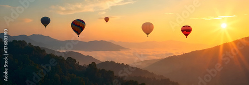 Obraz na płótnie A colorful group of hot air balloons is gracefully flying over a majestic mountain range during a beautiful sunset sky display w salonie