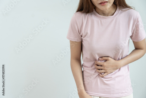 stomach ache. Asian women have abdominal pain, indigestion, gastritis, menstrual cramps, flatulence, diarrhea, distention, colon cancer, belly inflammation problem, suffer food poisoning, abdomen
