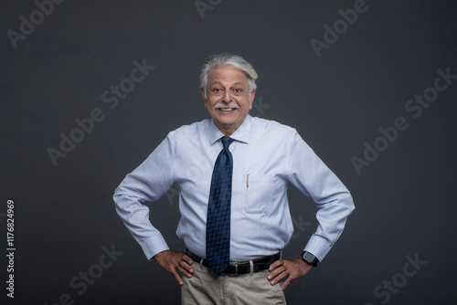 Senior Man With Both Hands On His Waist