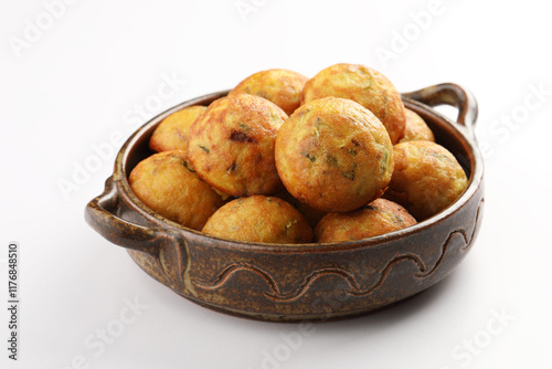 paniyaram, a Southindian dish made from fermented batter,Paniyaram, Kuzhi paniyaram Gunta ponganalu paddu, guliyappa made of black lentils and rice snack photo