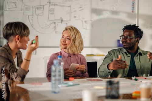 Marketing team brainstorming new ideas during office meeting