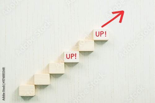 Wooden blocks forming a staircase with UP! text, red arrow pointing upward, light wood background. Concept of growth, progress, success. Ai generative photo