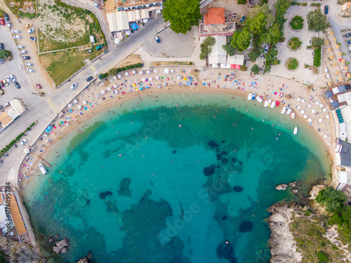 Scenic Bay View with beach, mountains and crystal-clear sea in Paleokastritsa, Corfu, Greece aerial view photo