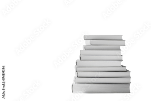 Stacked books in various sizes arranged neatly on a white background showcasing literary potential and knowledge photo