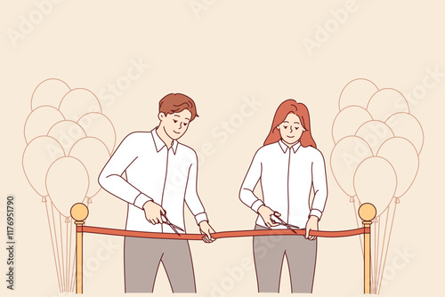 Opening ceremony of new business by man and woman cutting red ribbon at gala event. Business people participate in corporate ceremony to create another branch of store or service center