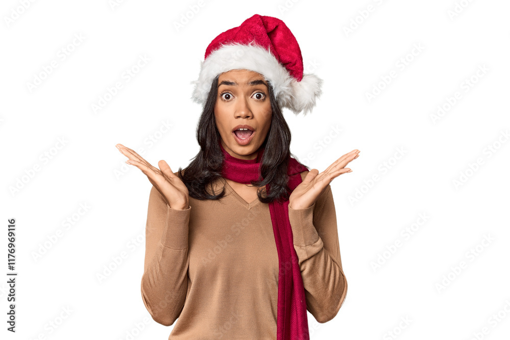 Filipino in Christmas attire and Santa hat surprised and shocked. Filipino in Christmas attire and Santa hat surprised and shocked.