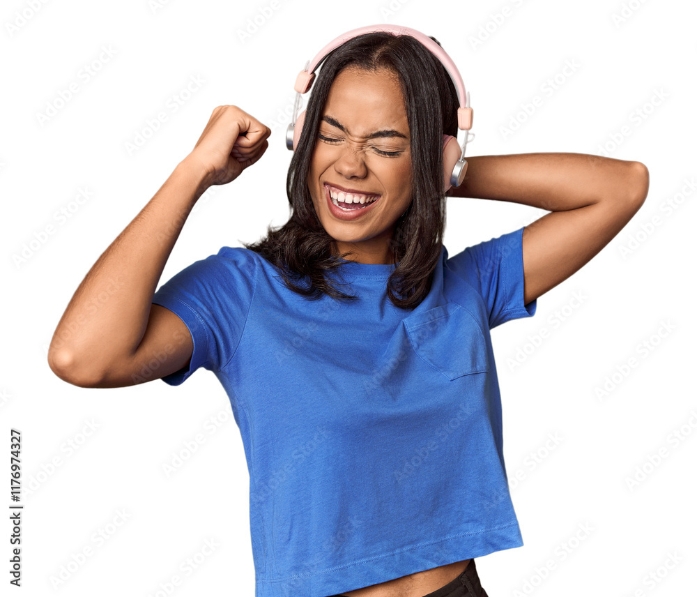 Joyful Filipino woman dancing with headphones Joyful Filipino woman dancing with headphones