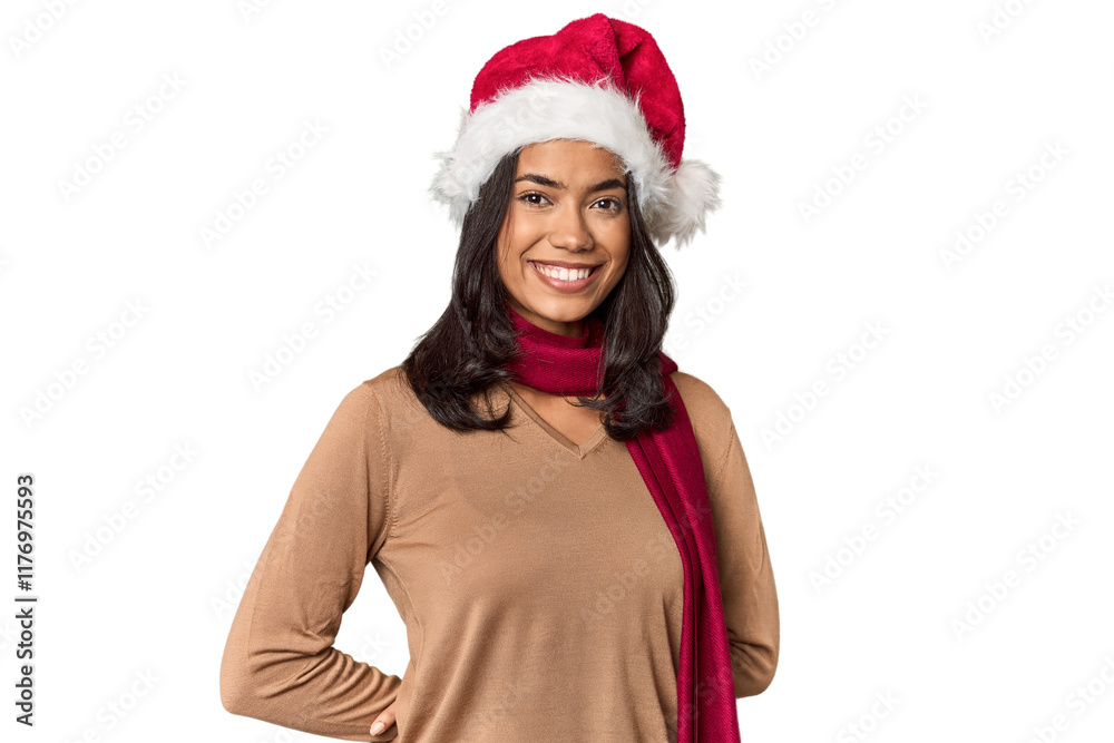 Young Filipino woman in Santa hat, festive mood Young Filipino woman in Santa hat, festive mood