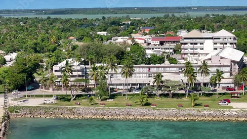 Nukualofa city, Tonga. Aerial panoramic of traffic on the shore and commercial buildings. photo