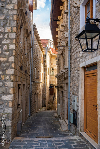 Narrow street in Ulcinj Old Town in Montenegro, the southernmost city at Montenegrin coast, Europe photo