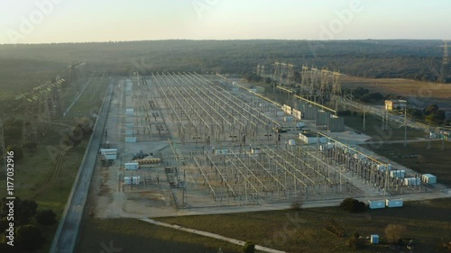 Aerial shot of a power plant in the countryside at sunset, Gard, France