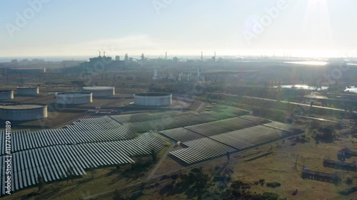 Aerial view of factories, tanks and solar panels in an industrial zone by the sea, Fos-sur-Mer, France